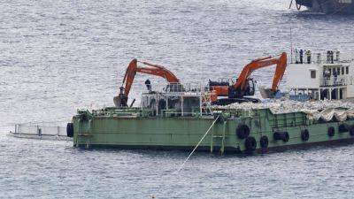 Denny Tamaki - Japan resumes landfill work at new US military site on Okinawa despite local opposition - apnews.com - Japan -  Tokyo - China - Usa -  Washington