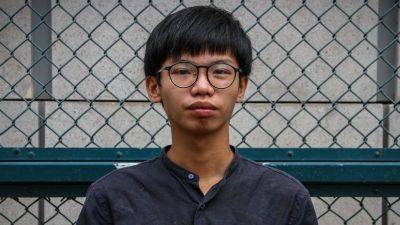 Hong Kong activist flees to UK citing ‘stringent surveillance’ by national security police following his prison release - edition.cnn.com - Japan - China -  Beijing - Hong Kong -  Hong Kong - Britain