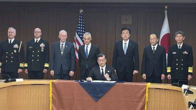 Minoru Kihara - MARI YAMAGUCHI - Japan signs agreement to purchase 400 Tomahawk missiles as US envoy lauds its defense buildup - apnews.com - Japan -  Tokyo - China - Usa - Britain - North Korea - Australia - county Emanuel