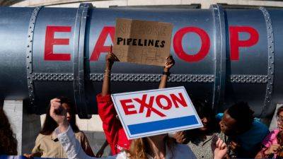 U.S. oil giant Exxon Mobil sues activist investors to prevent climate proposals
