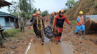 Associated Press - Philippines - At least 10 die in Philippines, including children, when landslide buries house during prayers - scmp.com - Philippines