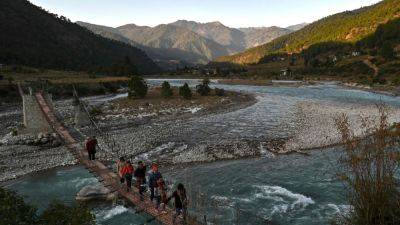 Biman Mukherji - Bhutan seeks India deals in US$15 billion hydropower push to raise national happiness - scmp.com - Usa - India - Bhutan - state Assam