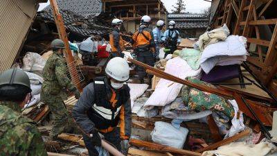 Yoshimasa Hayashi - Earthquake survivors in Japan sleep in coats and hats at shelters without heat or running water - edition.cnn.com - Japan - prefecture Ishikawa