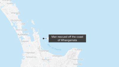 ‘Miracle’ rescue ends fisherman’s ordeal after falling overboard and fending off shark - edition.cnn.com - New Zealand