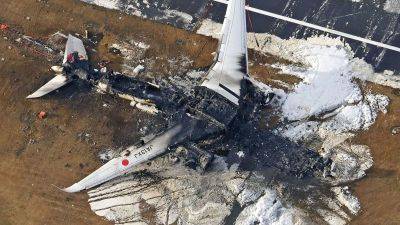 Miracle at Haneda: Passengers describe terror and relief after fiery Japan Airlines collision - edition.cnn.com - Japan -  Tokyo - Canada