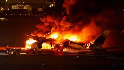 Japan Airlines jet bursts into flames after collision with earthquake relief plane at Tokyo Haneda airport - edition.cnn.com - Japan - Canada - France -  Tokyo, Japan