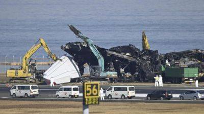 Japanese air safety experts search for voice data from plane debris after runway collision - apnews.com - Japan -  Tokyo