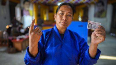 Tshering Tobgay - Bhutan’s People’s Democratic Party wins election in Himalayan kingdom and returns to power - apnews.com - China - India - Bhutan