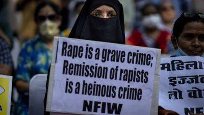 India court restores life prison sentences for 11 Hindu men who raped a Muslim woman in 2002 riots - apnews.com - India -  New Delhi - state Gujarat - Muslim