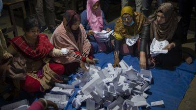 Khaleda Zia - Hasina wins Bangladesh vote, but low turnout and opposition boycott raise doubts over its legitimacy - apnews.com - China - India - Bangladesh -  Dhaka, Bangladesh