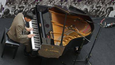 AP PHOTOS: A blind pianist from Nagaland says music is ‘one thing that has kept me alive’