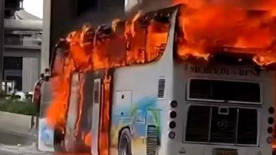 Up to 25 feared dead, mostly children, in Thailand school bus blaze