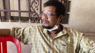 A Cambodian reporter who exposed scams charged over online posts