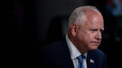 Tim Walz - Walz’s claim that he was in China during Tiananmen Square protests undercut by unearthed newspaper reports - edition.cnn.com - China - Hong Kong - province Guangdong - New York - state Ohio - state Minnesota - city Beijing - city Hong Kong