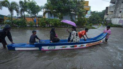 Monsoon flooding closes schools and offices in India’s southern IT hubs