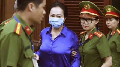 Vietnamese real estate tycoon sentenced to life for billions in fraud in government graft crackdown