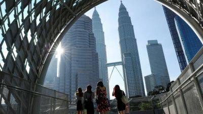 Malaysia’s record 2025 budget to boost economy, welfare, as Anwar leverages political stability