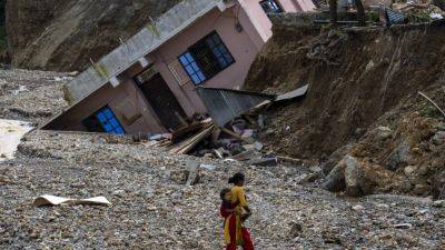 NIRANJAN SHRESTHA - Nepalese grapple with loss after floods kill over 200 people - apnews.com - Nepal - county Valley - city Kathmandu, Nepal