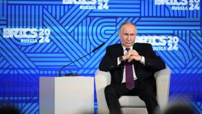 Vladimir Putin - Yuri Ushakov - Putin hosts a summit in a bid to show the West it can’t keep Russia off the global stage - apnews.com - China - Russia - Malaysia - India - South Africa - Ukraine - Iran - Azerbaijan - Uae - Turkey - Saudi Arabia - Egypt - Brazil - Ethiopia - city Kazan