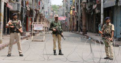 Militants kill 7, including 6 migrant workers, in India's Kashmir