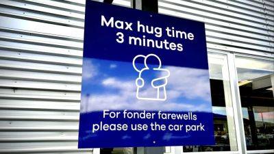 New Zealand airport sets 3-minute time limit on goodbye hugs