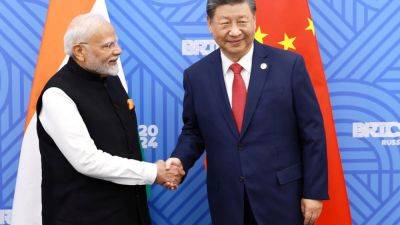 Xi Jinping - Narendra Modi - Liu Zhen - Xi Jinping and Narendra Modi meet, two days after a China-India border deal - scmp.com - China - Russia - India - county Summit - city Kazan, Russia