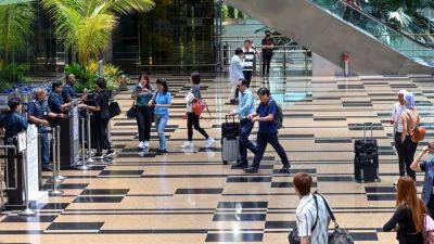 Singapore fully expands passport-less immigration clearance at Changi Airport