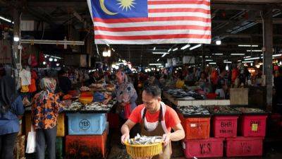 Wealthier Malaysians gripe as Anwar’s ‘pro-poor’ budget hits them in the pocket