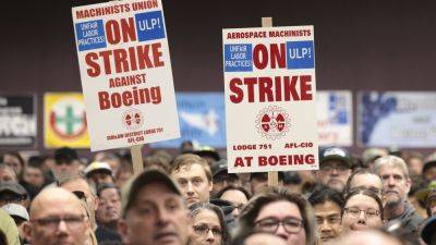 Boeing machinists reject new labor contract, extending more than 5-week strike