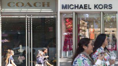 Judge blocks Coach owner Tapestry's proposed acquisition of Michael Kors parent Capri