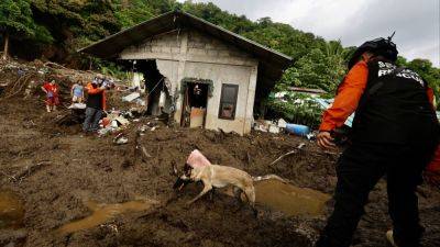 Tropical Storm Trami leaves at least 115 dead and missing in Philippines