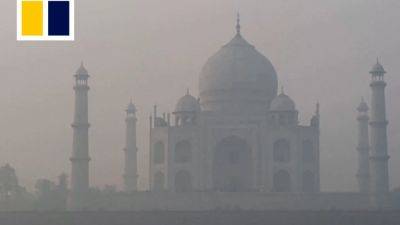 In India, ‘suffocating’ haze and pollution grip New Delhi and other cities