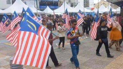 Hadi Azmi - Chinese flag dispute in Malaysia sparks nationalist backlash, escalating tensions - scmp.com - China - Malaysia - city Shanghai