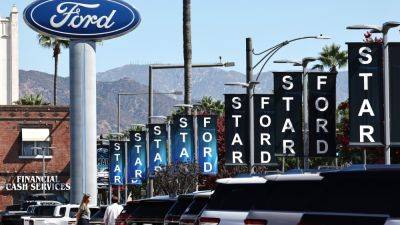 Ford Motor - Michael Wayland - Ford guides to low end of 2024 earnings forecast as it slightly tops Wall Street's third-quarter expectations - cnbc.com - city Detroit