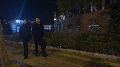 A knife attack near a school in Beijing injures 5 people, including 3 children