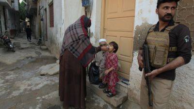 Attack on a health center dealing with polio in northwestern Pakistan kills a police officer