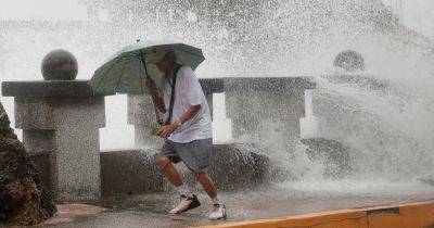 2 Killed as Typhoon Krathon Drenches Taiwan Before Landfall - nytimes.com - Taiwan - state Indiana - county Atlantic - county Hualien - county Taitung - city Kaohsiung - county Pingtung