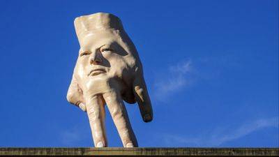 Hands off: New Zealand waves goodbye to its giant ‘monster’ hand sculpture