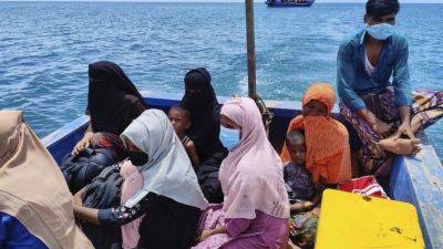 Agence FrancePresse - 6 dead as dozens of Rohingya refugees ‘stranded’ on Indonesia beach by traffickers - scmp.com - Indonesia - Malaysia