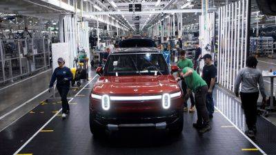 Rivian shares fall after EV maker slashes production forecast, misses Q3 delivery expectations