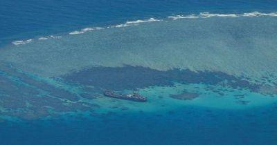 Philippines accuses China of assaulting Vietnamese fishermen in South China Sea