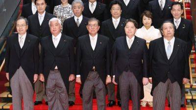 Japan admits editing ‘embarrassing’ photo of Ishiba’s cabinet