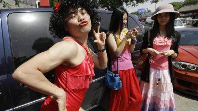 Foreign men fined for wearing women’s clothing in Malaysia