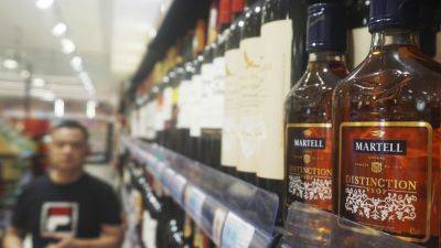 China puts provisional tariffs on European brandy after EU OKs duties on Chinese EVs - apnews.com - France - China - Germany - Eu - city Beijing