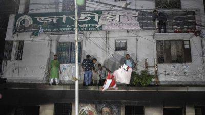 Attackers set fire to the headquarters of a Bangladesh party that backed ousted leader Sheikh Hasina