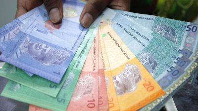 Malaysia’s ringgit slides towards new all-time low on lacklustre growth