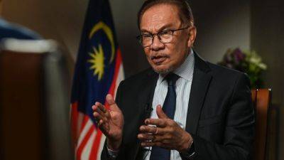 Malaysia’s Islamist party applauds PM Anwar’s vow to put sharia bill back before parliament