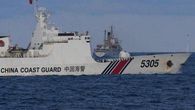 Taiwan minister says 5 China coast guard ships entered waters around Kinmen