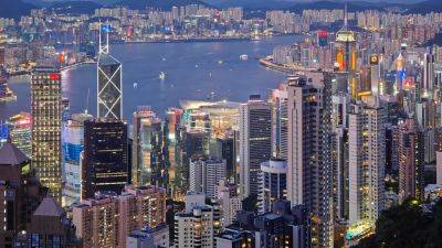 Lee Ying Shan - Hong Kong property stocks jump after city scraps cooling measures - cnbc.com - Hong Kong - city Hong Kong
