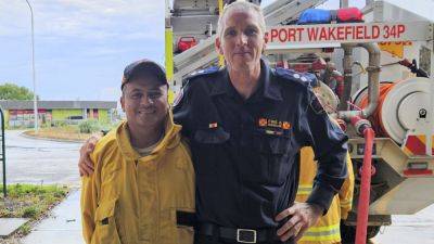 Filipino volunteer who saved Outback fire brigade celebrated in Australian Parliament